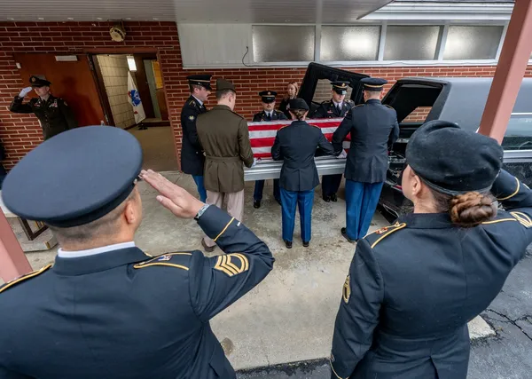 Dignified transfer of U.S. Army Spc. Sarah Beckstrom, 20, of the West Virginia National Guard, killed in the November 26 shooting near the White House.